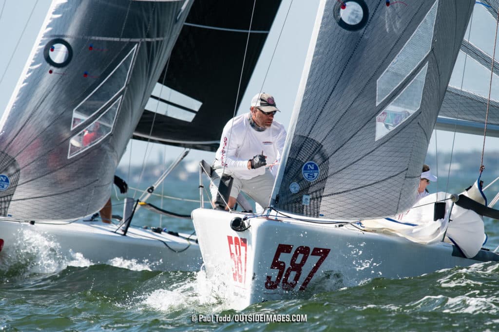 Melges 24 sailboats rounding a mark in Florida.