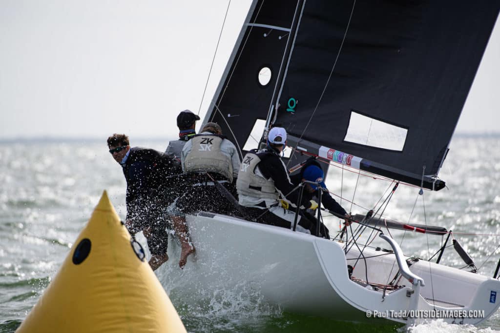 Melges 24 sailboat rounding a mark