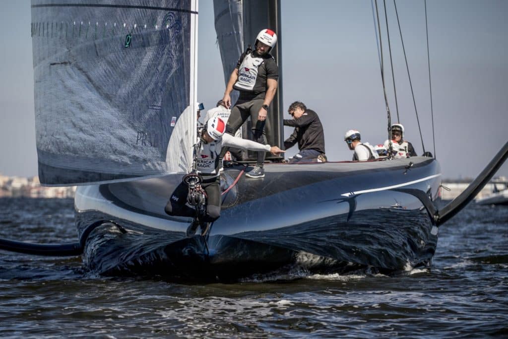 American Magic bowman Nick Dana tends to the furling headsail on American Magic's Defiant, in Pensacola in February.