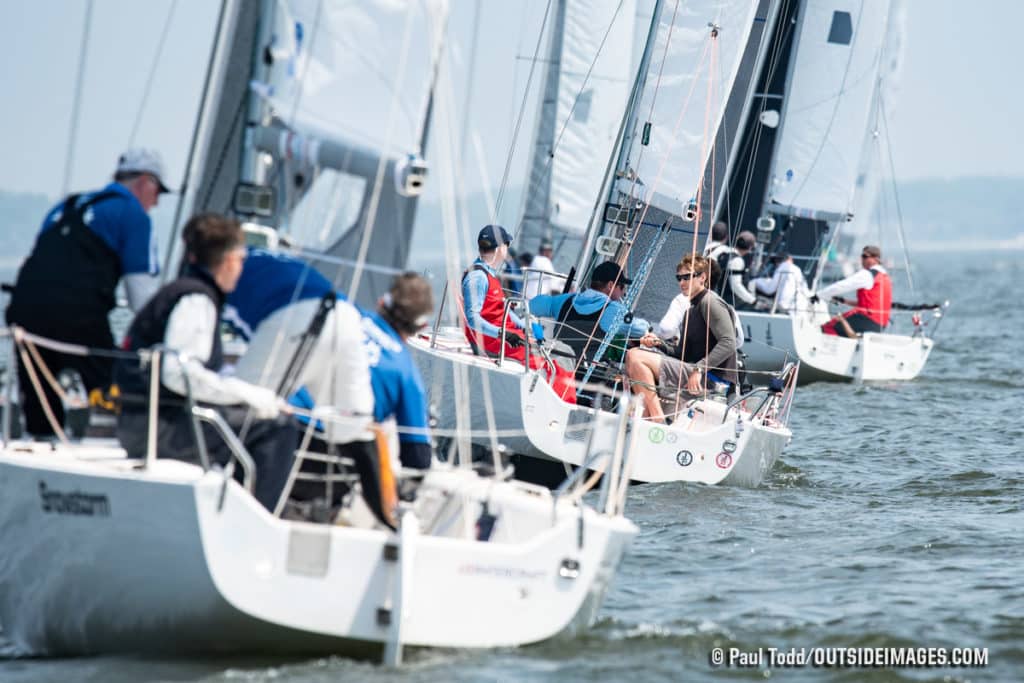 Three sailboats in a row