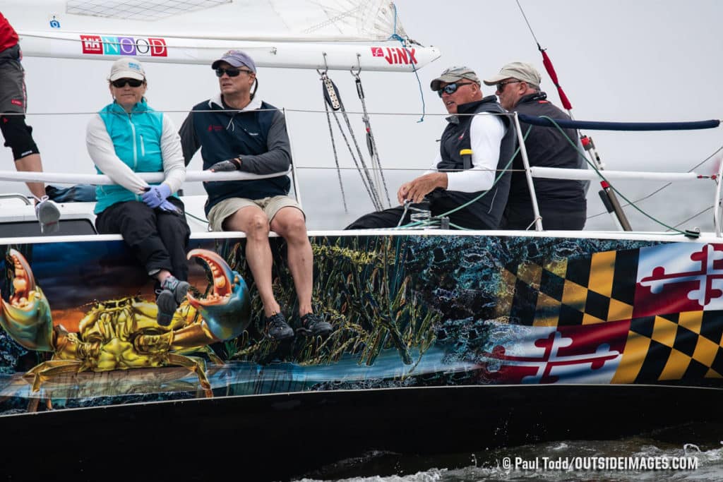 People sitting in a sailboat