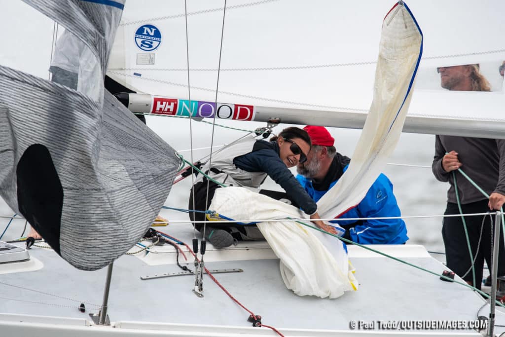 Man in sunglasses on a sailboat