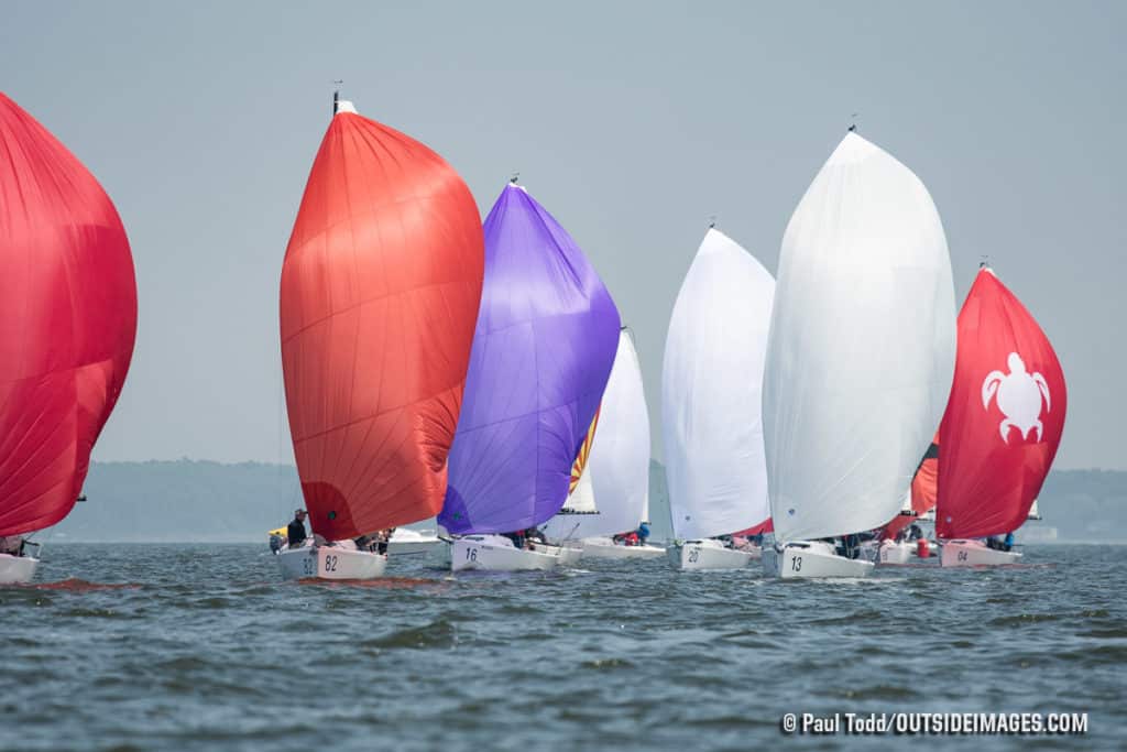 several sailboats in the water