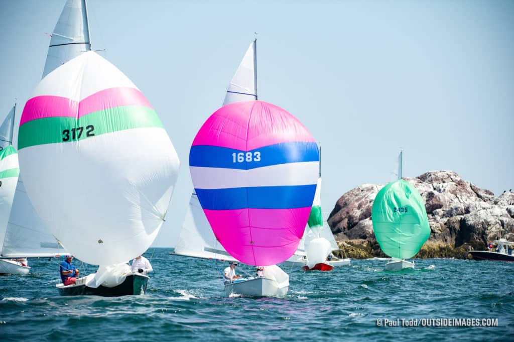 Pink and blue sailboat race