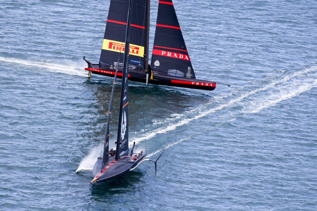 Two AC75s cross paths on the Hauraki Gulf in New Zealand during the 36th America's Cup.