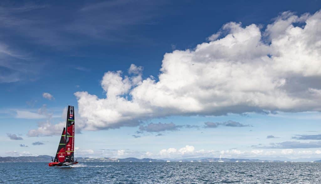 Boat sailing and cloud in sky.