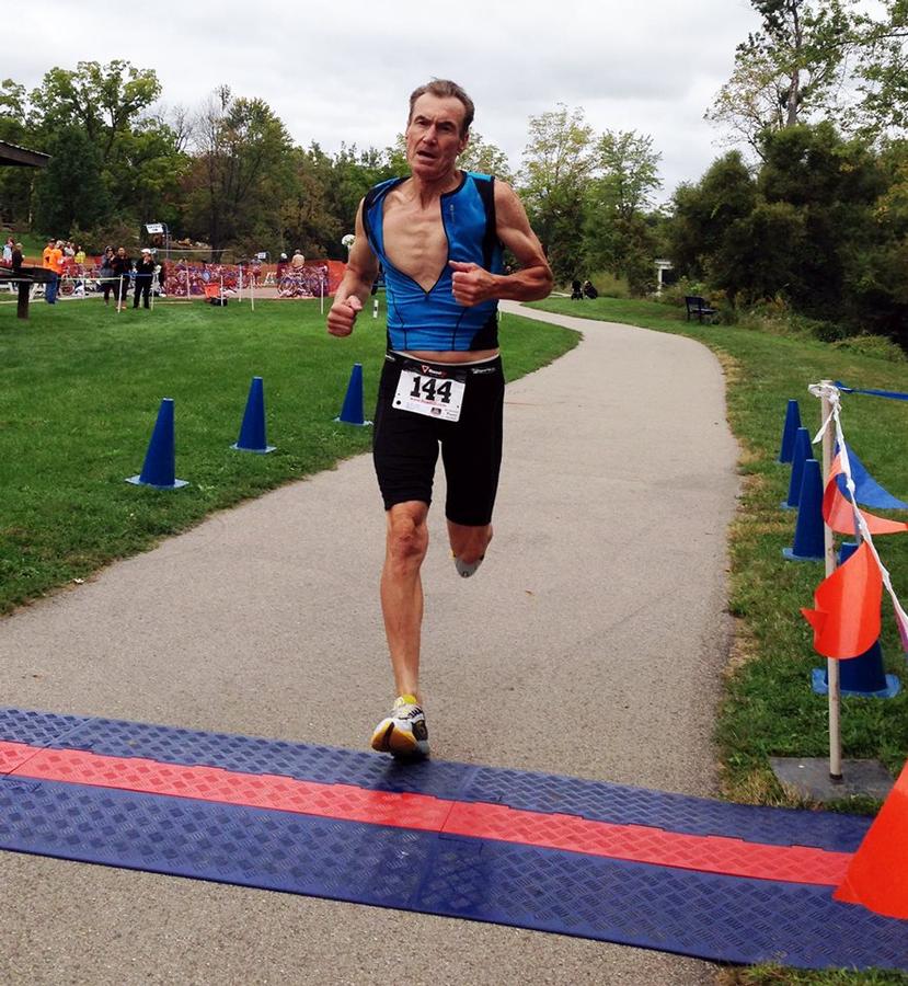 Fitness runner finishing a race