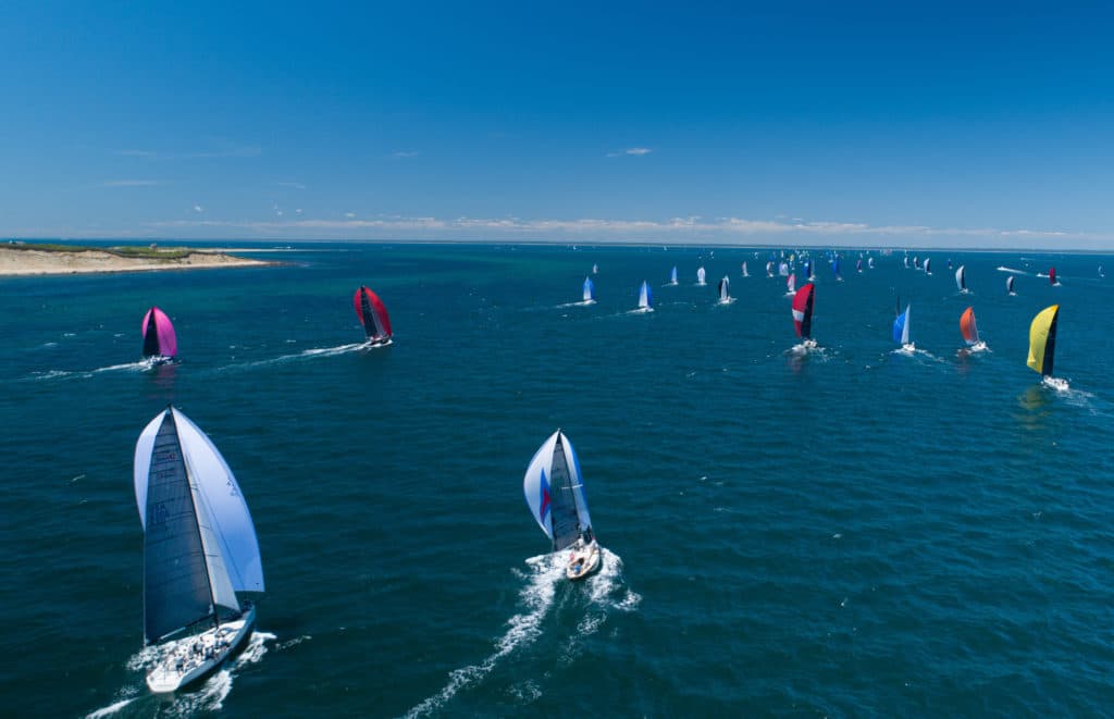 boats sailing around an island