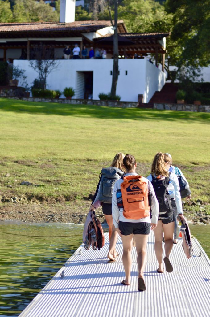 sailors walk up dock