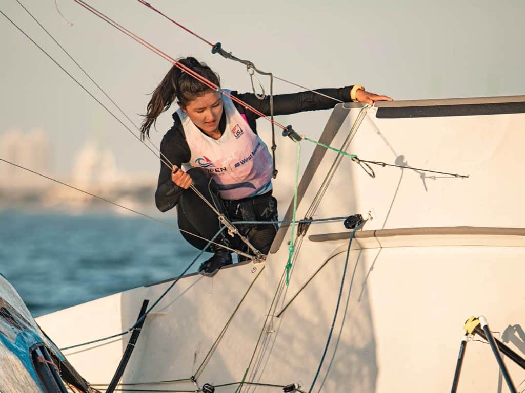 Lucy Wilmot rights her sailing boat during a capsize.