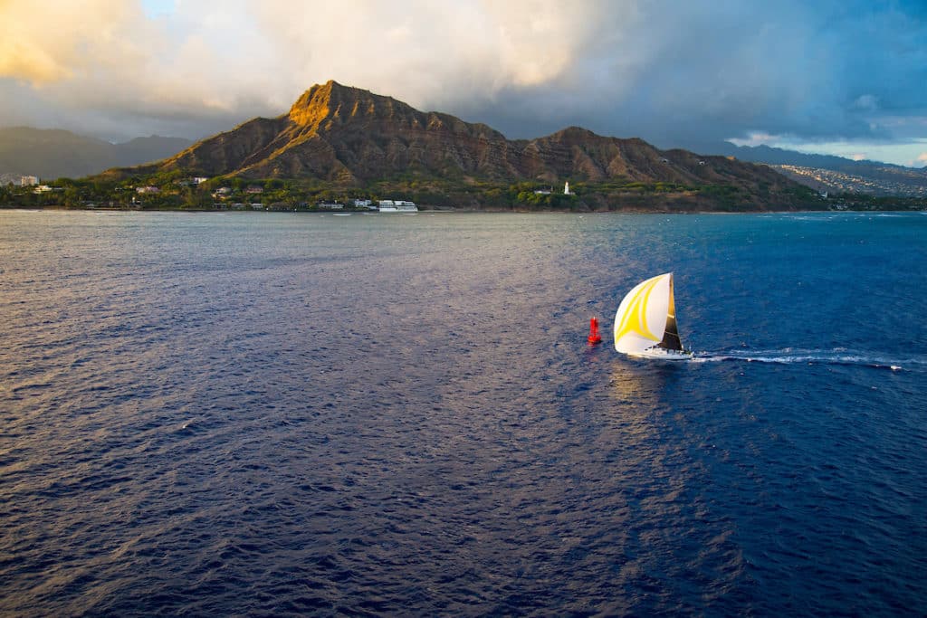 Sailboat finishing a race off Hawaii.