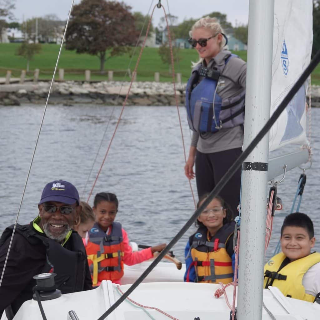 National Sailing Hall of Fame Lifetime Achievement Award recipient Captain William D. “Bill” Pinkney, the first African American to solo-circumnavigate the world via the Capes, joins Sail Newport kids for lap of Newport Harbor during the induction ceremony weekend.
