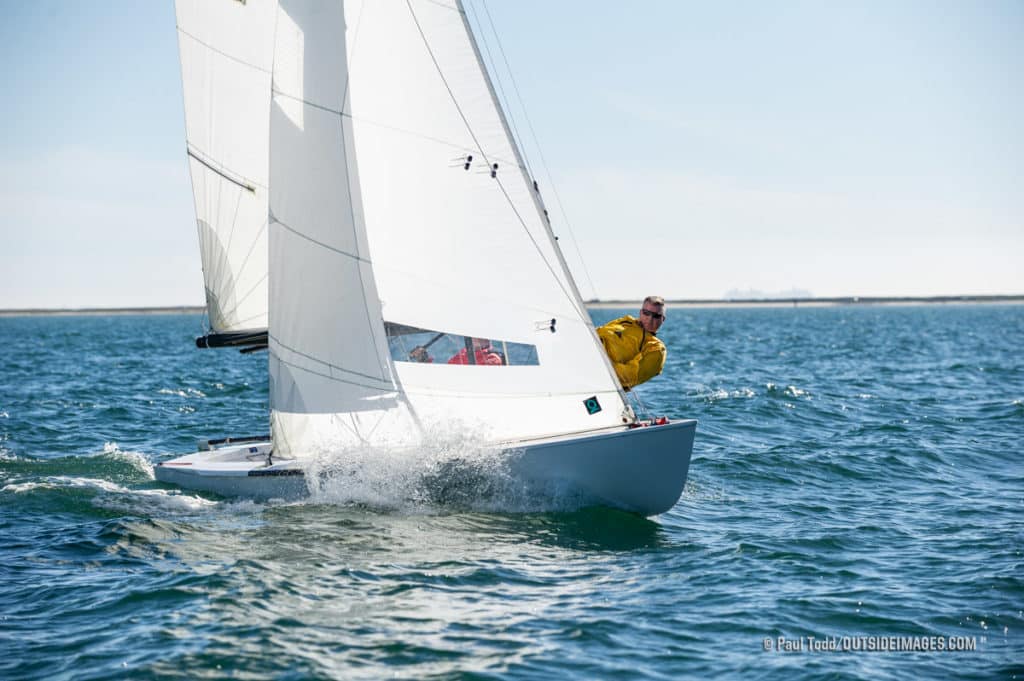 sailors on a Flying Dutchman monohull