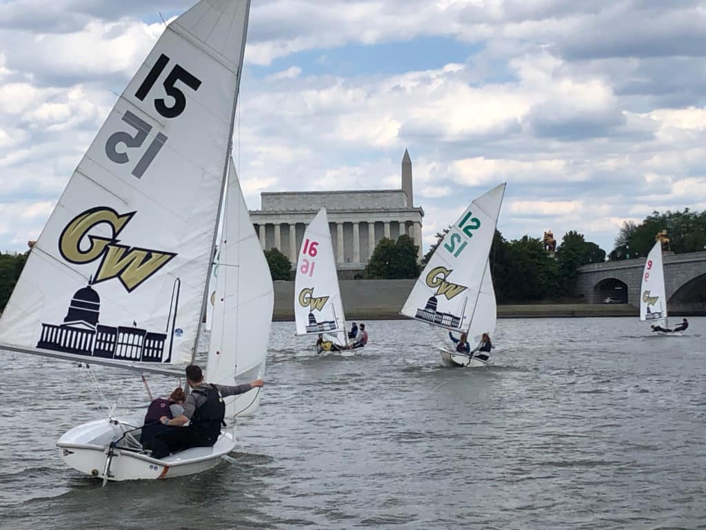 college sailors practicing on the Potomac River near the Lincoln Memorial and Washington Monument