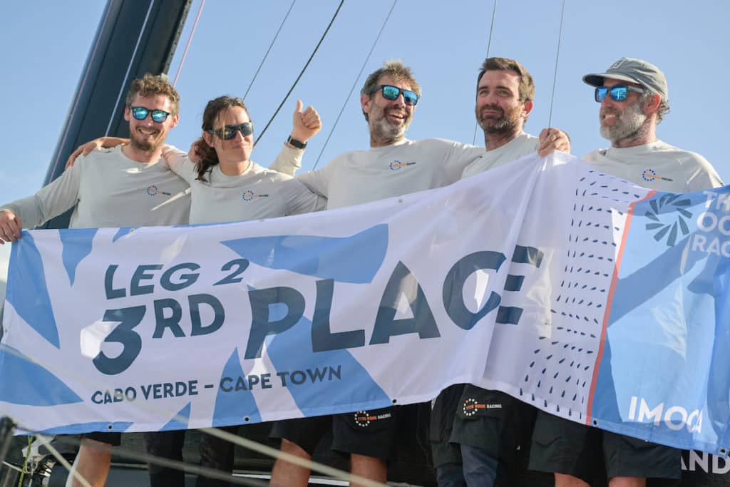 11th hour team winners celebrating third place in the ocean race leg 2 to cape town.