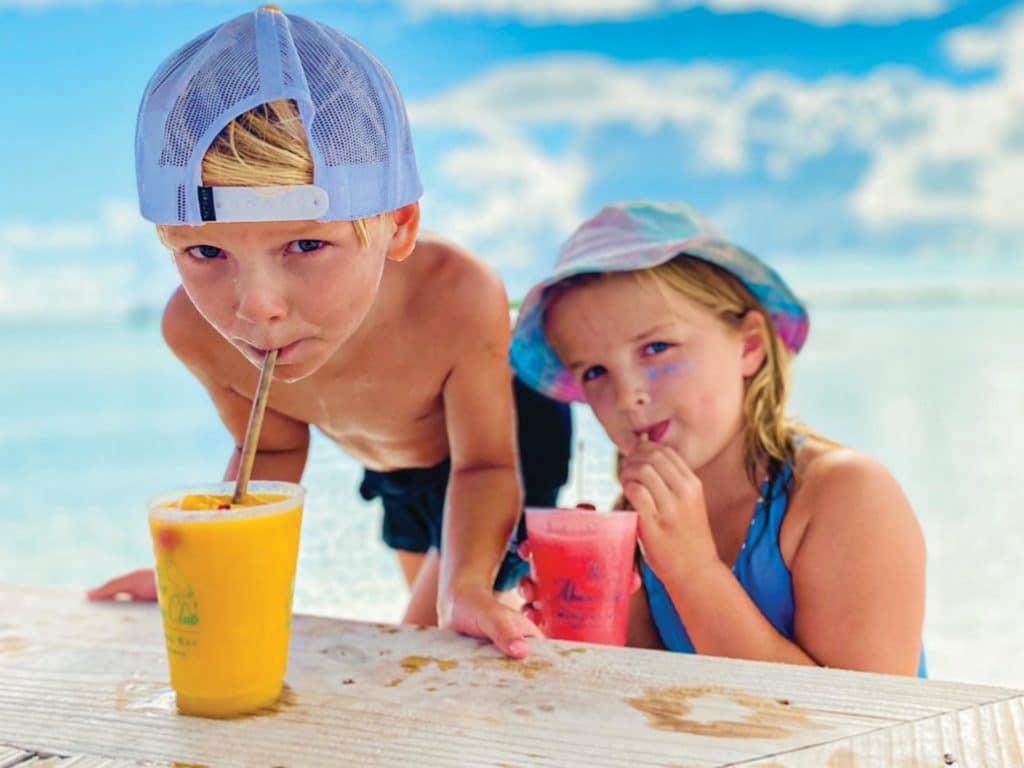 Kids enjoying smoothies in the Abacos