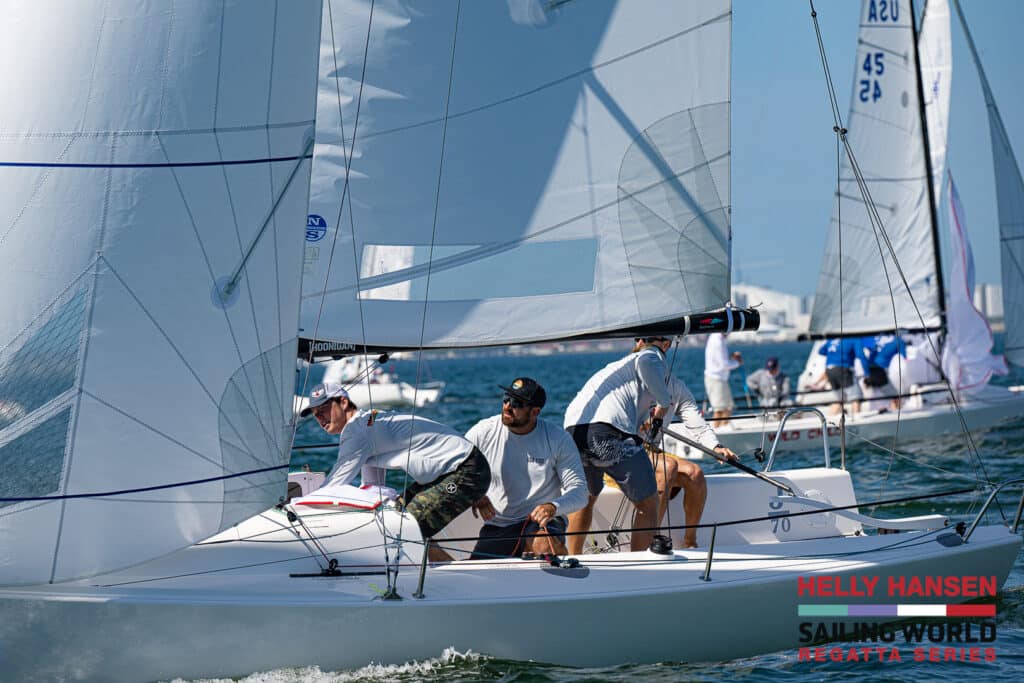 sailboats racing in florida, with crew action and focus