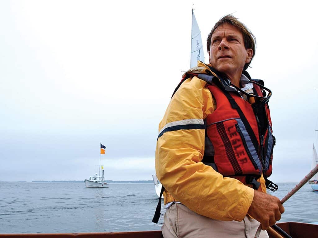 Ken Legler on a sailboat