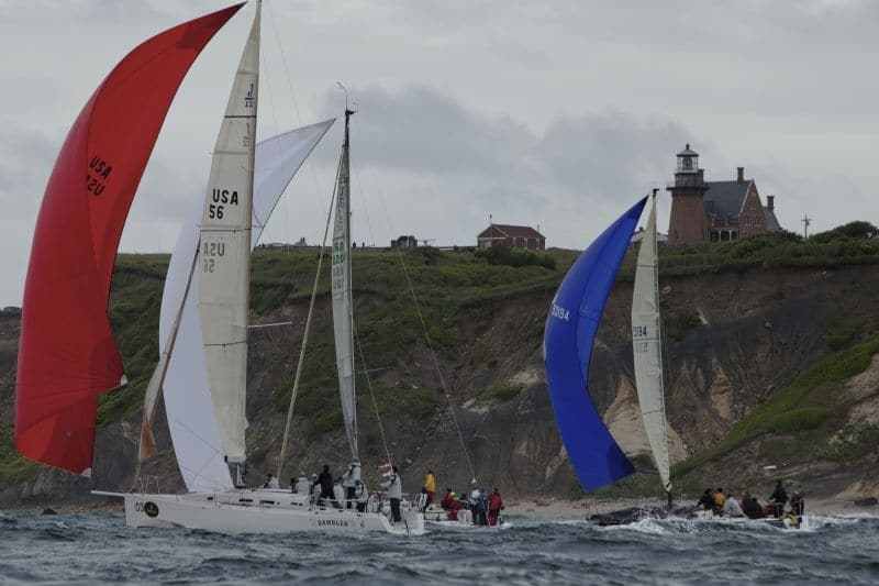 Doug Shaffer's J/122 GAMBLER, Andrew Weiss's J/122 CHRISTOPHER DRAGON and Ben Hall's Evelyn 32 BLUTO pass Southeast Lighthouse during the Around the Island Race Monday at Block Island Race Week.