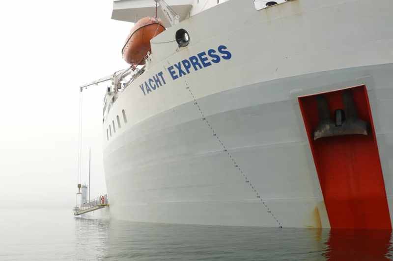 Yacht Express sits partially submerged in Naragansett Bay