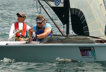 Nick Scandone drives the Skud 18 while Maureen McKinnon-Tucker takes care of
all the crewing responsibilities. Nick Scandone drives the Skud 18 while Maureen McKinnon-Tucker takes care of all the crewing responsibilities.