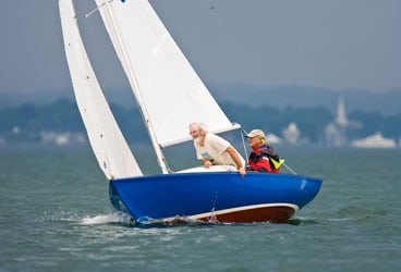 John Burnham crewed in his Uncle Bill’s Bullseye for three years before his
family bought their own boat, /Querida/, which they’ve sailed ever since.
Here are Paul and Dave Burnham at the 2008 Bullseye Nationals at Fishers
Island, New York. For more John Burnham crewed in his Uncle Bill's Bullseye for three years before his family bought their own boat, Querida, which they've sailed ever since. Here are Paul and Dave Burnham at the 2008 Bullseye Nationals at Fishers Island, New York. For more photos from the event, click here.