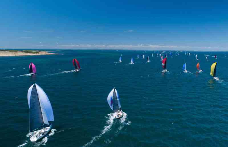 boats sailing around an island