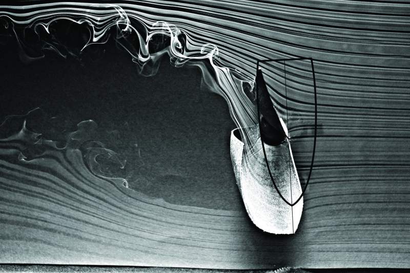 When flying an asymmetric spinnaker, three essential controls come into play, the sprit-pole extension, tack line height,  and halyard tension.