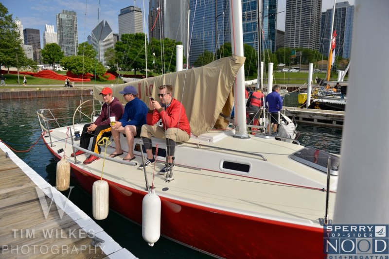 The crew of Steve Knoop's winning J/105 waits out the day's eventual abandonment because of strong winds Lake Michigan. With no more races to sail they won the series and the overall haul; an invitation to the Caribbean NOOD Championship.