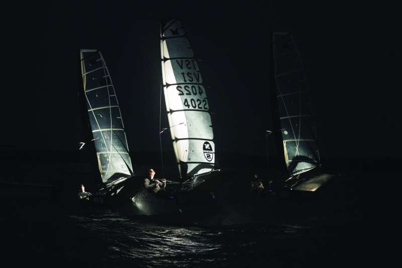 moth sailing at night