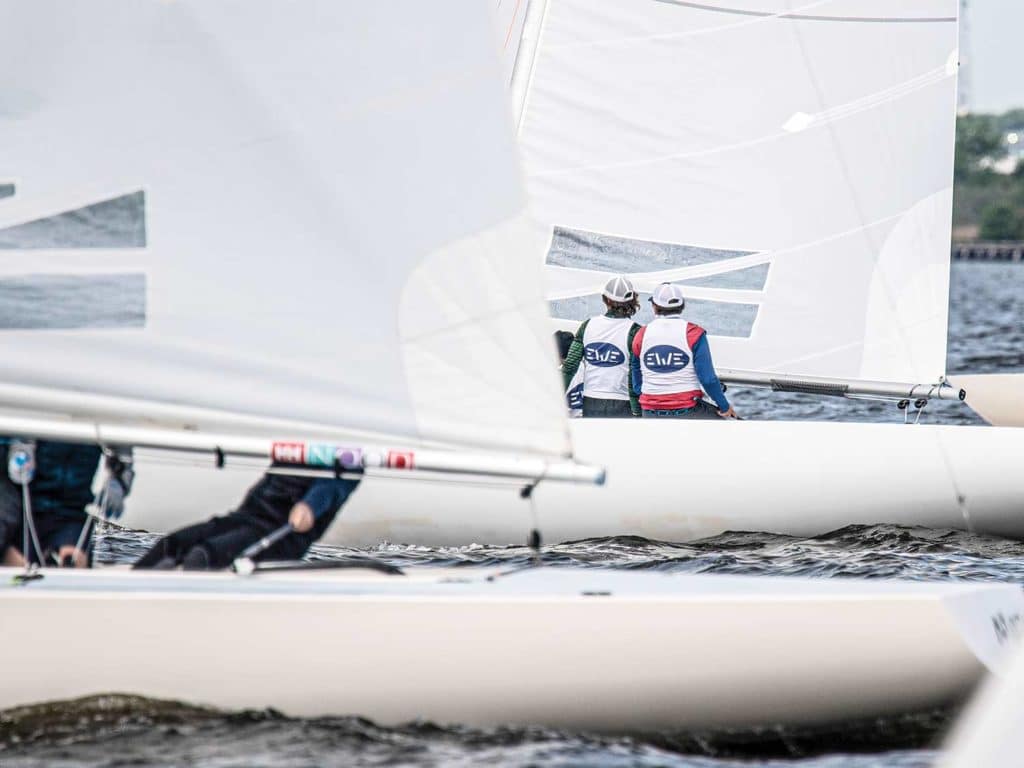 A fleet of sailboats on the water.