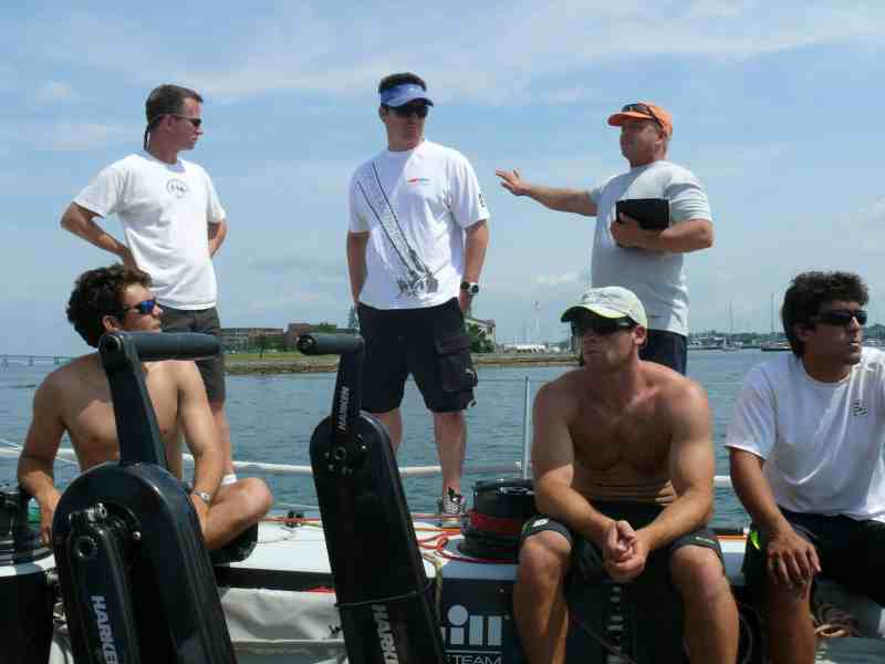 Ralf Steitz, one of AAOT's coaches and the head of the Kings Point Sailing Foundation, gives the team a prep talk before the start.