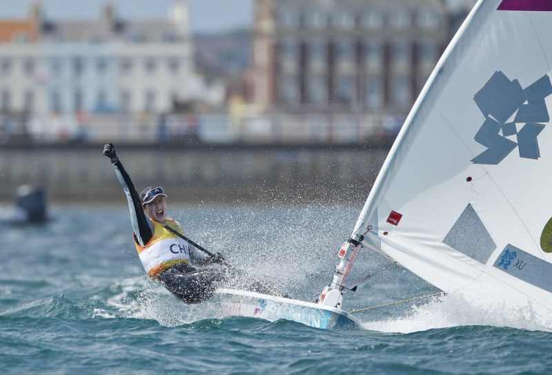 20120806 Copyright onEdition 2012©
Free for editorial use image, please credit: onEdition
Lijia Xu (CHN) who won Gold the Medal today, 05.08.12, in the Medal Race Women's One Person Dinghy (Laser Radial) event in The London 2012 Olympic Sailing Competition.
The London 2012 Olympic Sailing Competition runs from 29 July to 12 August and brings together 380 of the world's best sailors to race on Weymouth Bay.
Sailing made its Olympic debut in 1900 and has appeared at every Olympic Games since 1908.
In 2012 athletes from 63 nations are competing across ten Olympic sailing events.
For additional images please go to: http://www.w-w-i.com/isaf_sailing_2012/
For more information please contact: Daniel Smith, marketing@isaf.co.uk or phone +44 (0) 7771 542 131
If you require a higher resolution image or you have any other onEdition photographic enquiries, please contact onEdition on 0845 900 2 900 or email info@onEdition.com
This image is copyright the onEdition 2012©.
This image has been supplied by onEdition and must be credited onEdition. The author is asserting his full Moral rights in relation to the publication of this image. Rights for onward transmission of any image or file is not granted or implied. Changing or deleting Copyright information is illegal as specified in the Copyright, Design and Patents Act 1988. If you are in any way unsure of your right to publish this image please contact onEdition on 0845 900 2 900 or email info@onEdition.com