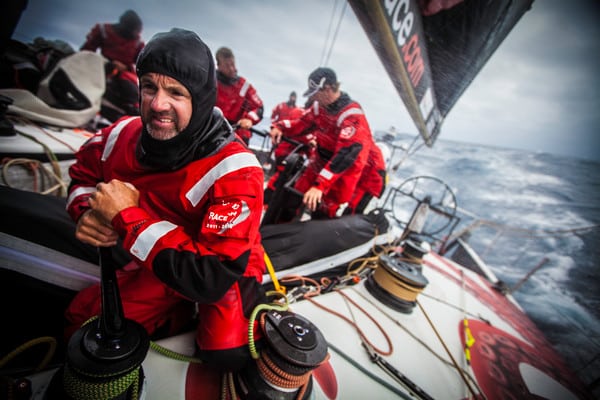 Jonathan Swain adjusting sail trim after a tack. Onboard PUMA Ocean Racing powered by BERG during leg 7 of the Volvo Ocean Race 2011-12, from Miami, USA to Lisbon, Portugal. (Credit: Amory Ross/PUMA Ocean Racing/Volvo Ocean Race)