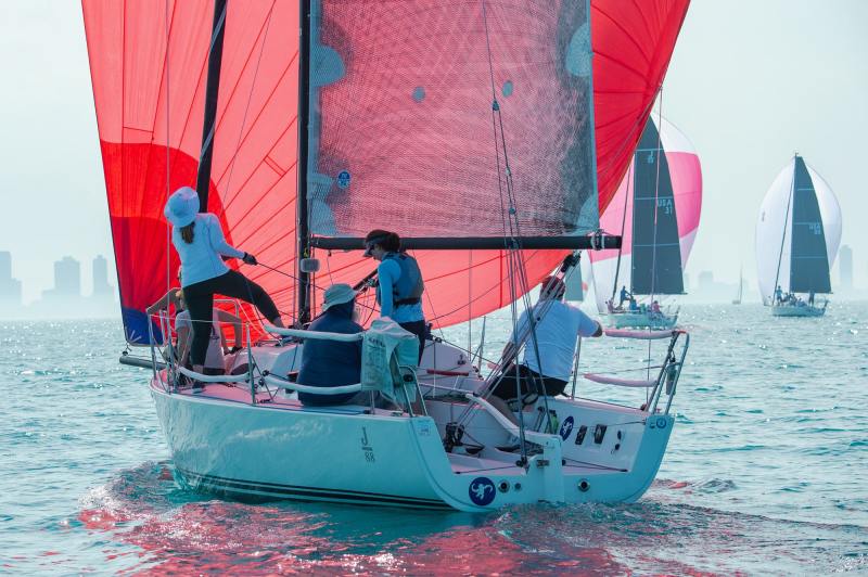 Michael Frerker’s team on the J/88 Funky Monkey makes its way down the run at the 2022 Helly Hansen Sailing World Regatta Series in Chicago.