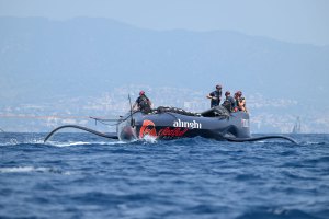 37AC_240820_RP1_0553 Alinghi Red Bull Racing's sailing team returns to base with a section of its broken spar on board Boat One.
