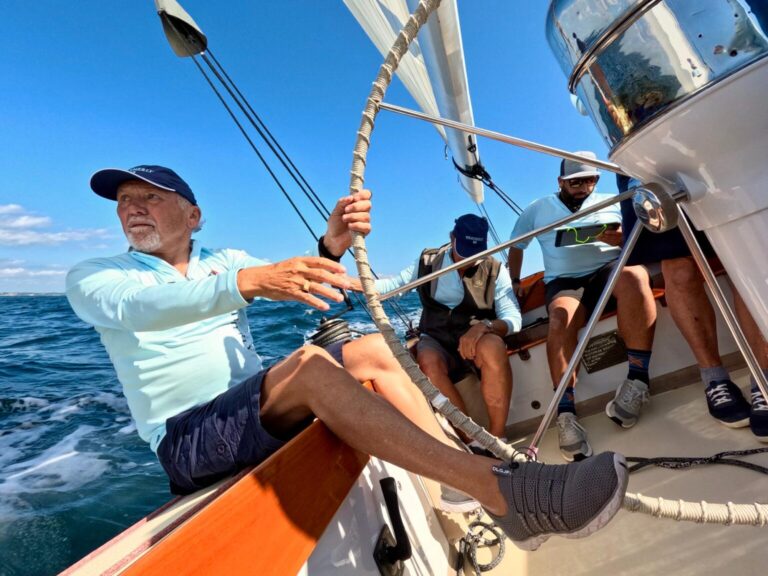 12 Metre skipper Steve Eddleston drives his 12 Meter Weatherly from the leeward wheel of the yacht.