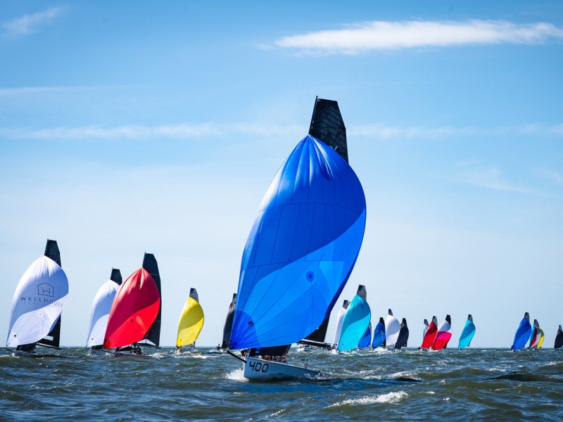 20251018_HLN_VX_750 VX One sportboats with colorful spinnakers racing in Florida.