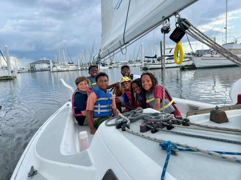 NOLA-1 Kids from the New Orleans Community Sailing Center on a sailboat at the dock.