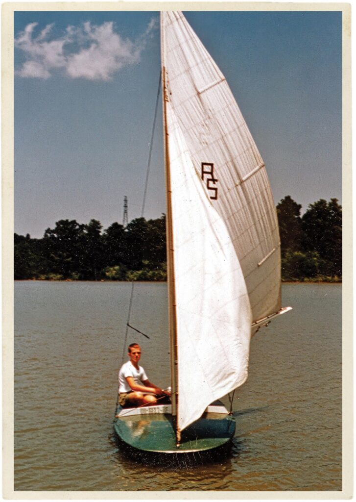 Alan Glos in his scow