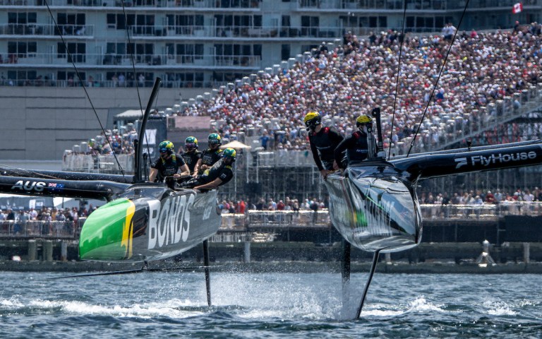 BONDS Flying Roos SailGP Team driven by Tom Slingsby races alongside NORTHSTAR SailGP Team driven by Giles Scott on Race Day 2 of the Canada Sail Grand Prix in Halifax, Canada. Sunday 21 June 2026. Rolex SailGP Championship Event 7 2026 Season.