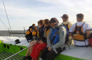 20170410_173656_resized (1) As a volunteer coach with Navy Sailing, Gary Jobson works with the midshipmen onboard a Farr 40 during a practice day on Chesapeake Bay.